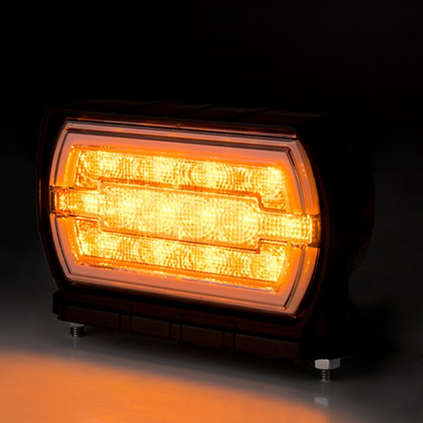 Phare LED avec support inférieur avec feu de position néon et feu clignotant A 1 CleoFront 12V 24V