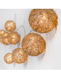 Guirlandas redondas trançadas em tecido de juta para foto ambiente Pallina New Garden | Leon Iluminação LED