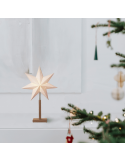 Estrella de mesa con luz de papel blanco Karo con base de madera ambiente