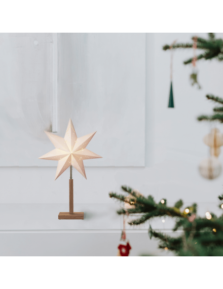 Estrela de mesa com luz em papel Karo branco com base ambiente em madeira