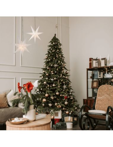 Estrela pendurada em papel branco com luz Frozen ambiente