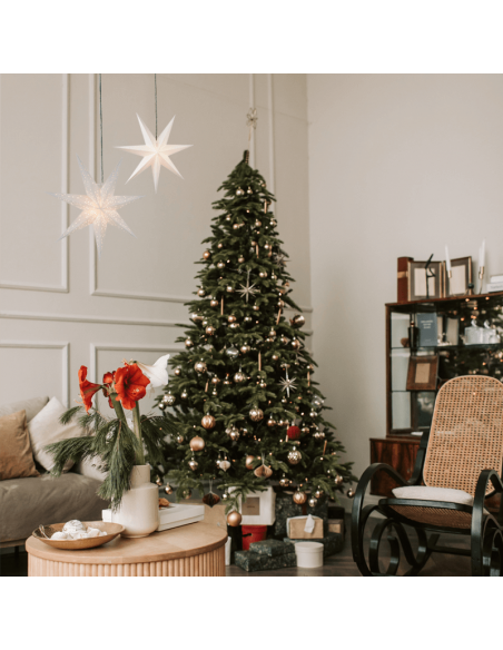 Estrela pendurada em papel branco com luz Frozen ambiente