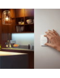 Soporte pared inalámbrico Philips Hue tap switch 4 botones y 1 selector color blanco colocado en la pared