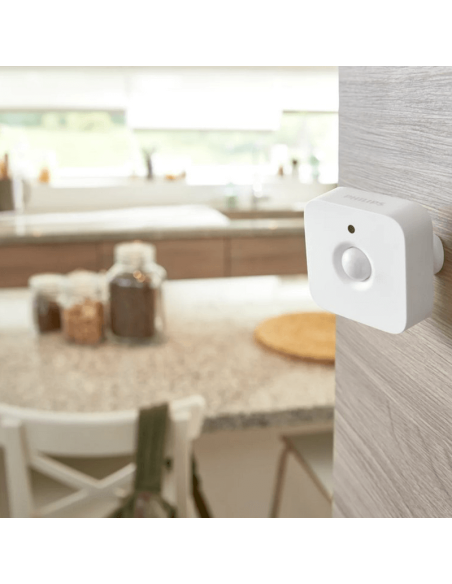 Capteur de mouvement Philips Hue Motion fixé au mur
