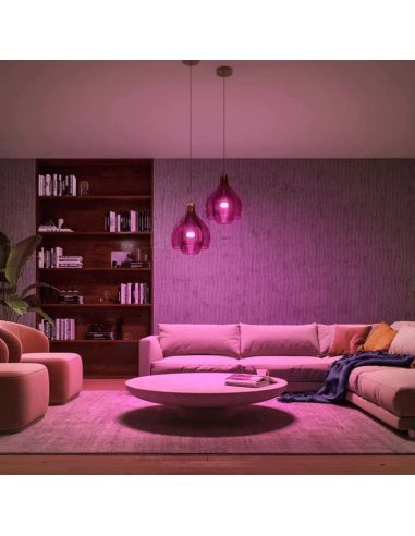 Kit de inicio 2 bombillas inteligentes E27 (1100lm) + regulador de intensidad y color Philips Hue tonalidad rosa en un salón