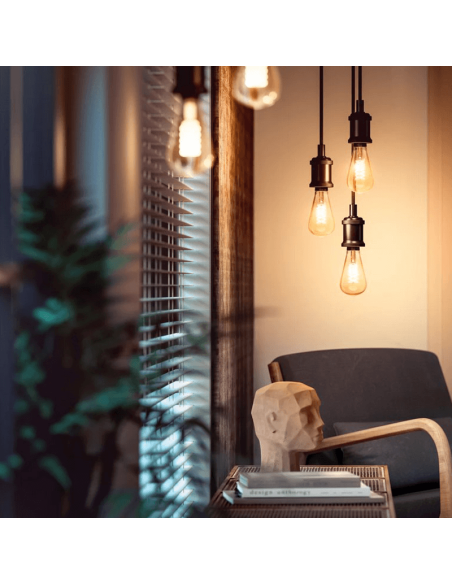 Bombilla inteligente Philips Hue 7W 2100K 550lm E27 filamento Edison bombilla encendida