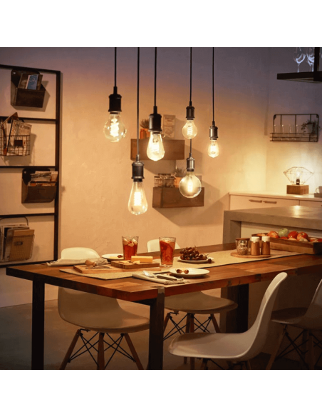 Bombilla inteligente Philips Hue 7W 2100K 550lm E27 filamento Edison en una lámpara