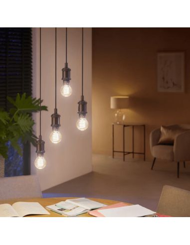 Bombilla inteligente Philips Hue White Ambiance 7W 2200-4500K Fil 550lm A60 E27 en una lámpara colgante