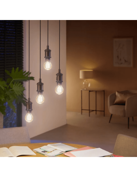 Bombilla inteligente Philips Hue White Ambiance 7W 2200-4500K Fil 550lm A60 E27 en una lámpara colgante