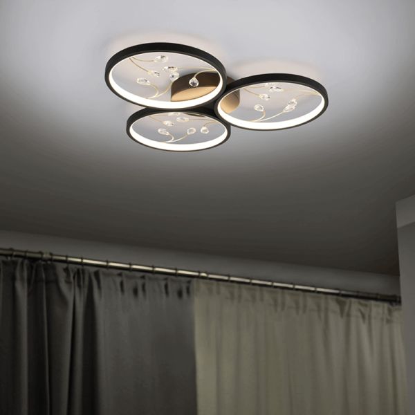 Plafonnier rond Groovy noir au plafond | leonleds