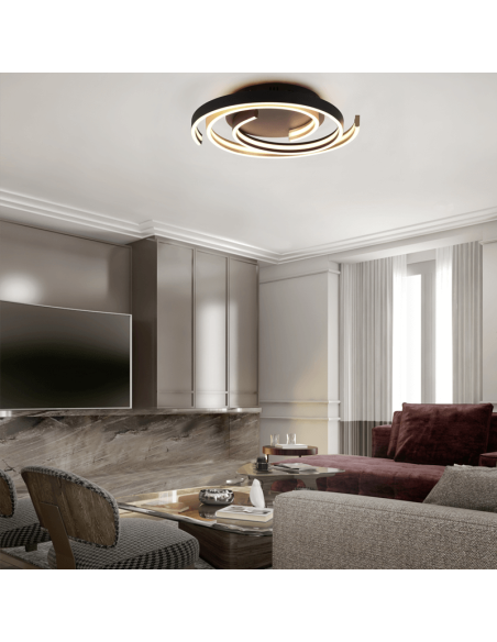 Plafón de techo Caya espiral negro encendido en un salón| LeonLeds