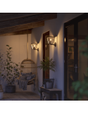 Aplique para exterior LED Inara Negro 1 luz 7W en un porche exterior