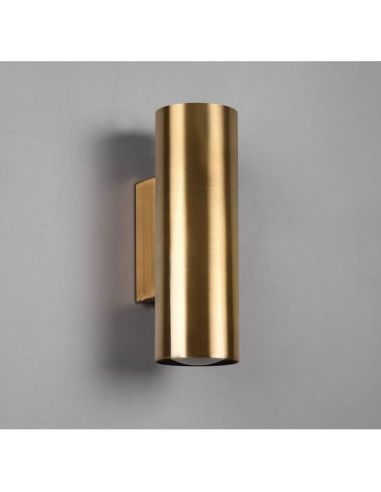 Aplique de pared CLEO cilíndrico, luz arriba-abajo color oro en una pared