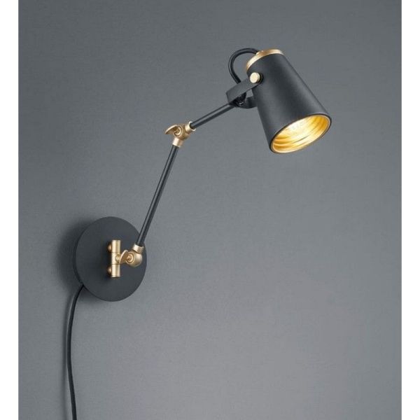 Applique ou flexible EDWARD pivotante coloris noir mat/or sur un mur