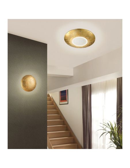 Applique murale LED circulaire CHIROS finition dorée 22cm 8W détail photo d'ambiance