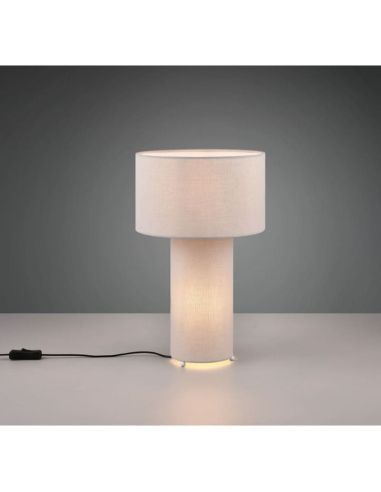 Lámpara de sobremesa BALE textil gris en una mesa encendida