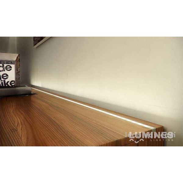 Perfil para Tira de  LED para Iluminación Decorativa en mobiliario y acabados interiores color bruto sujetar con tornillos cinta