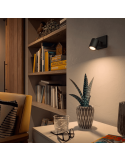 Foco LED individual Runner negro en una habitación